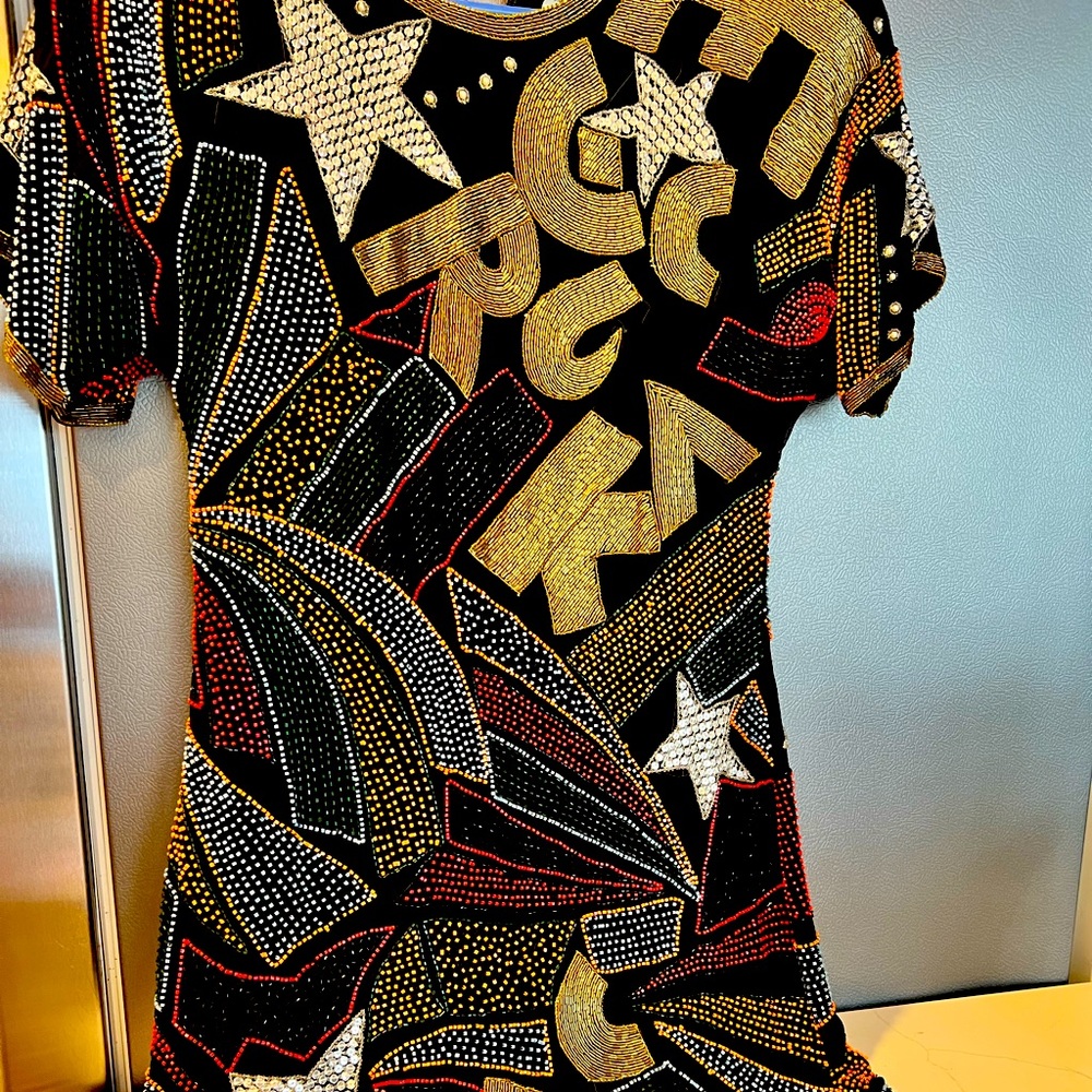 100 percent silk medium sequined dress.